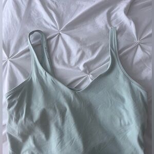 Mint Green Lululemon align tank, used well with a bit of pilling.